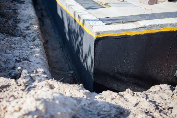 Professional Emergency Waterproofing technician working in Belmar, NJ